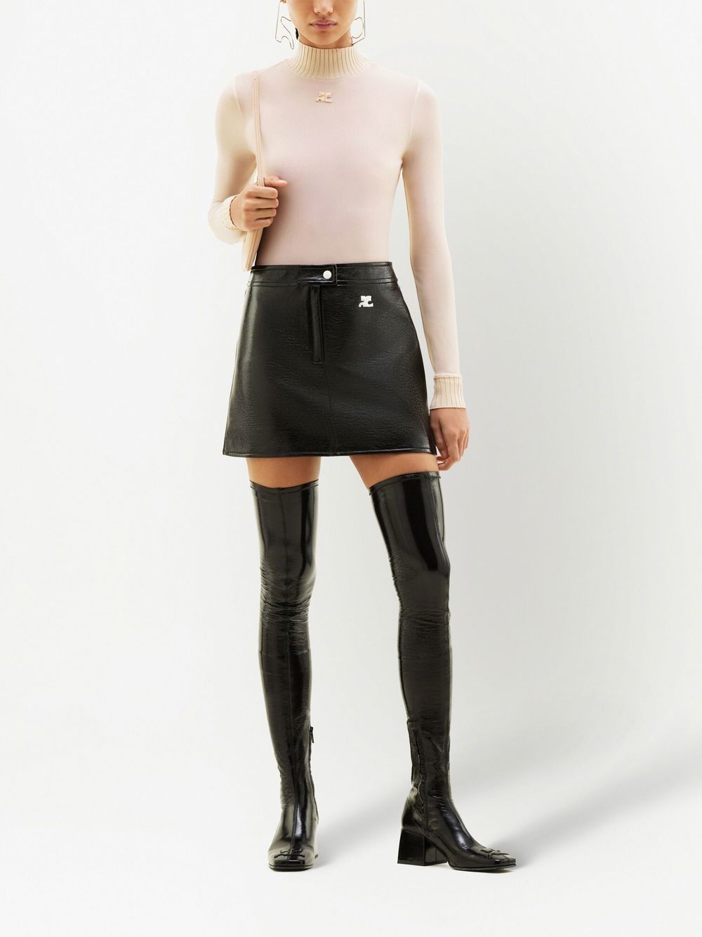 Iconic vinyl mini skirt by Courr ges Tessabit